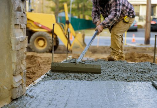 Truck Mixer Pouring Concrete Cement Into A Concrete With Sidewal